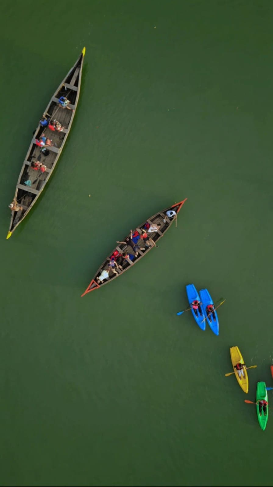 Silhouette of kayaker during golden hour
